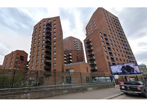 A man in his thirties has died due to a fall from a building in east London.