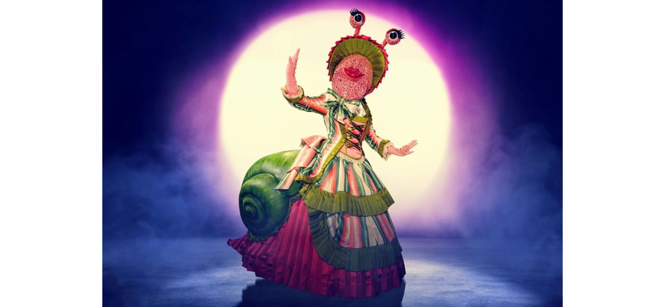 Is Snail on The Masked Singer a Bake Off star or a reality TV host? The clues and theories are being analyzed.