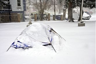 Denver is keeping its homeless shelter open longer in anticipation of snow and low temperatures.