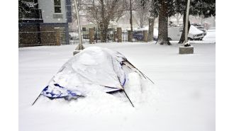 Denver is keeping its homeless shelter open longer in anticipation of snow and low temperatures.