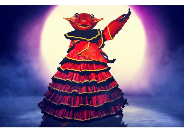 Who will it be: Jamie Foxx or Billy Porter? The Masked Singer's Dressed Crab has everyone guessing with clues and theories.