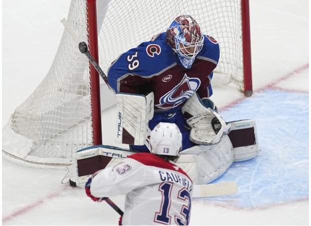 Canadiens beat sluggish Avalanche in shootout, end six-game win streak for Colorado.