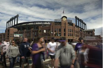 Is Coors Field a good example of a successful publicly funded stadium? Learn how the Monforts found success in LoDo.