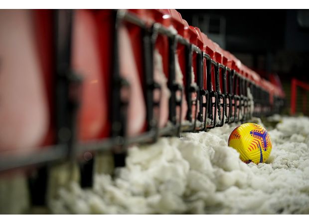 Which football games have been called off today because of the snow?