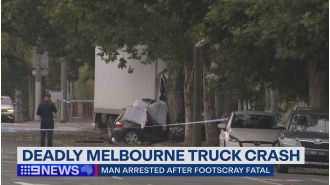 A driver died in Melbourne after a stolen truck reportedly ran through a red light.
