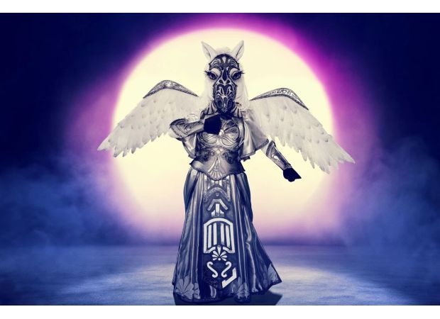 Masked Singer unmasks Pegasus as Bake Off star.