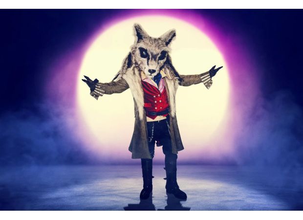 Is the Wolf on The Masked Singer a famous 80s musician or a Channel 4 host? Fans share their speculations and evidence.