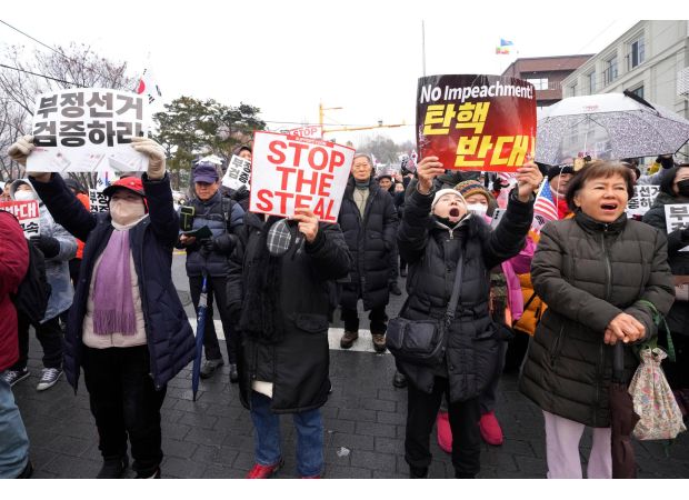South Korean agency wants police to handle detained impeached President Yoon Suk Yeol.