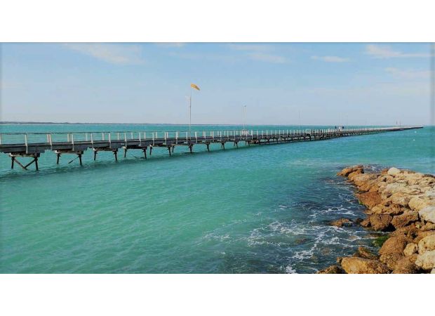 Two people were lost at sea after their boat flipped over near the coast of South Australia.