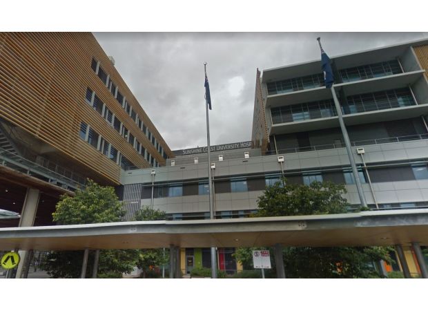 A man is accused of hitting a woman with an axe handle the day before she died.