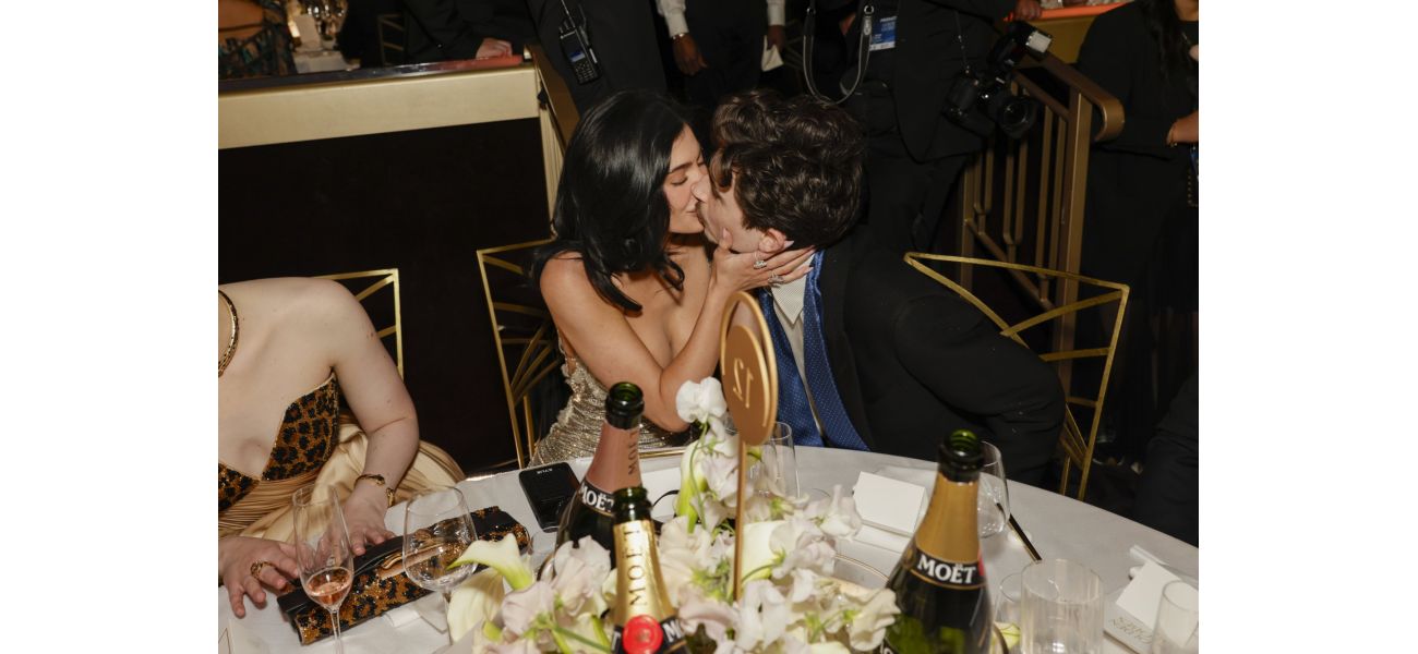 Kylie Jenner and Timotheé Chalamet share a rare public kiss amid rumors of her pregnancy.