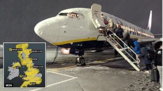 Manchester airport runways shut due to snow and UK under weather warnings.