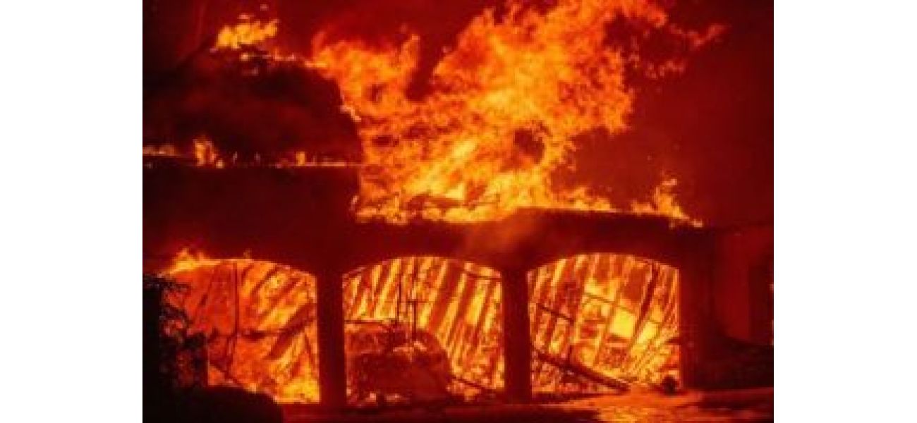 A new wildfire in Los Angeles area is rapidly spreading due to strong winds and is not yet contained.
