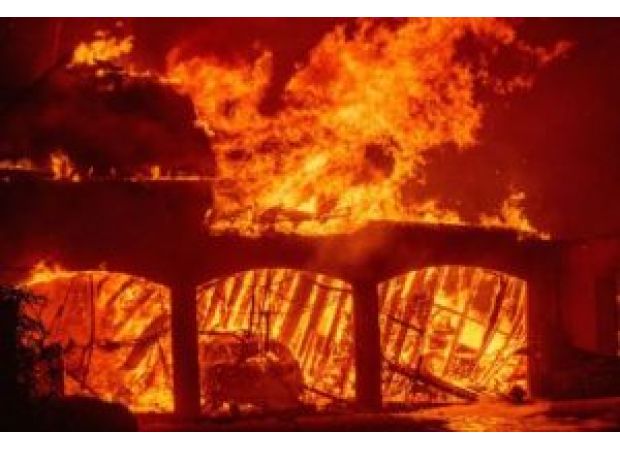 A new wildfire in Los Angeles area is rapidly spreading due to strong winds and is not yet contained.