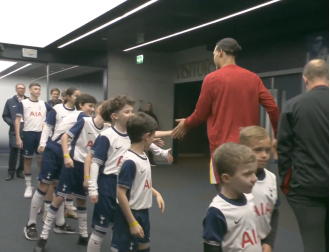 Tottenham's mascot asks Liverpool's Virgil van Dijk to join because their team lacks quality defenders.