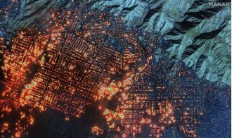 Massive fires in Los Angeles are visible from above due to their immense size.