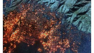 Massive fires in Los Angeles are visible from above due to their immense size.