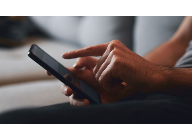 A teacher was prohibited from teaching after illegally accessing a coworker's phone to send a personal video to his own device.