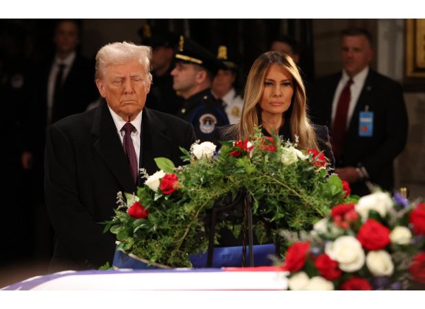 Melania Trump accompanies husband in paying respects to Jimmy Carter's casket.