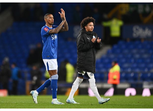 Darren Ferguson criticized for not letting Ashley Young's son play and missing chance to make history against Everton.