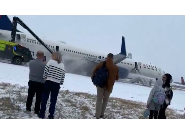 200+ passengers use slides and 4 hurt as plane aborts takeoff.