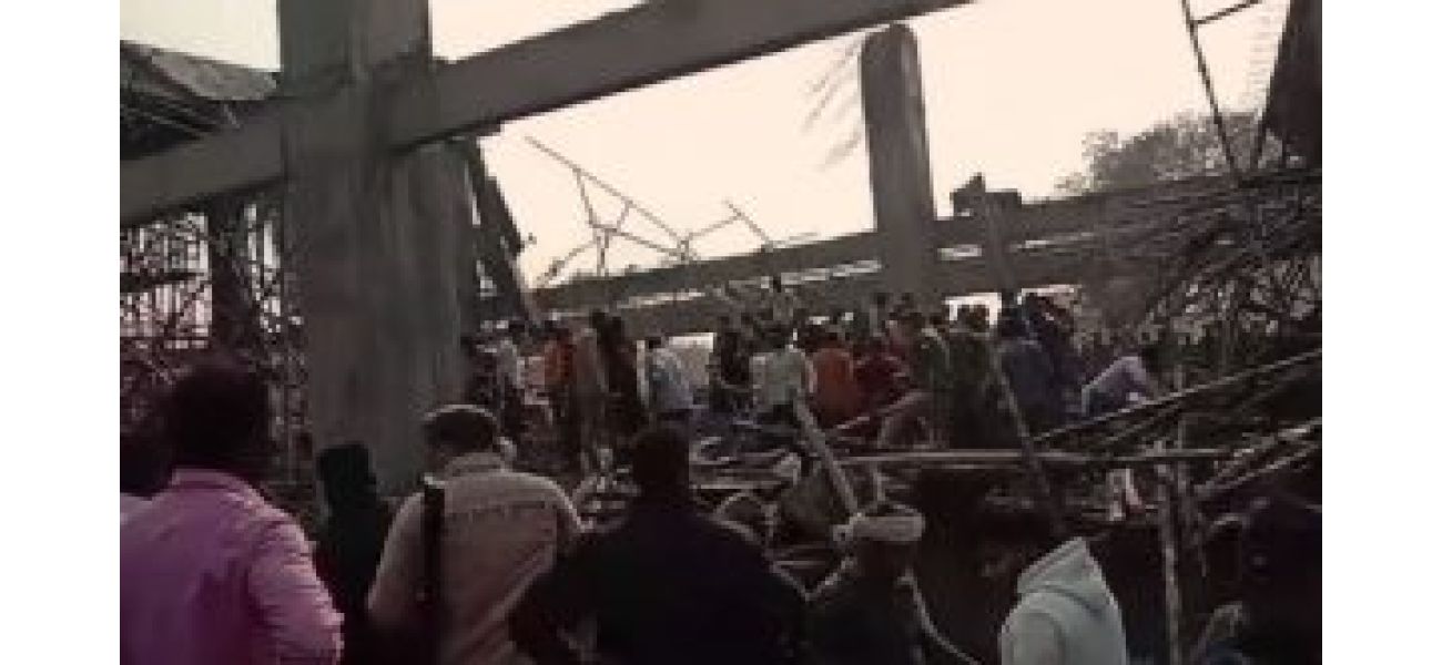 Possible paraphrase: Construction site in Kannauj railway station, UP collapsed, trapping multiple individuals.