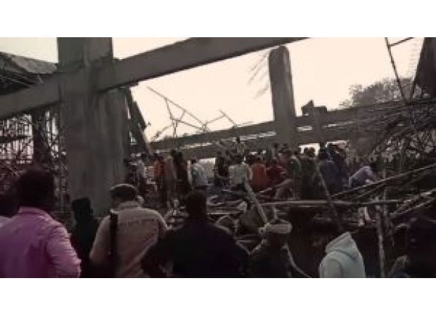 Possible paraphrase: Construction site in Kannauj railway station, UP collapsed, trapping multiple individuals.