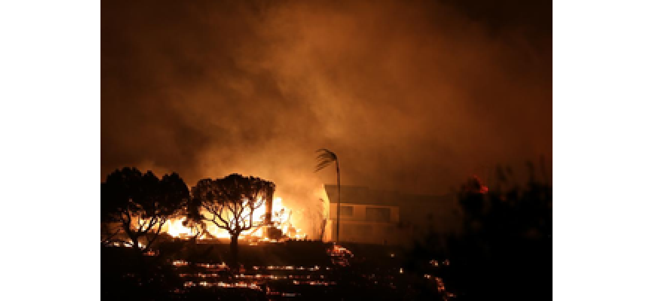Crews battle strong winds to protect homes and landmarks as death toll increases in Los Angeles wildfires.