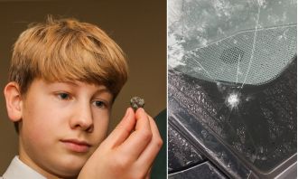 A meteorite hit our car windshield, causing it to crack.