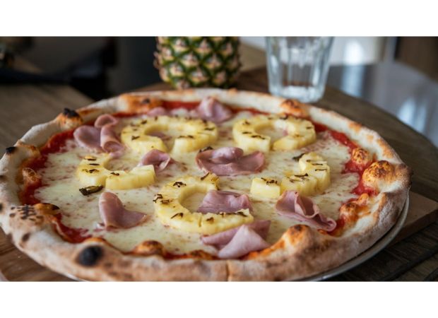 A restaurant hates making pineapple pizzas so they charge £100 for it.