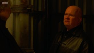 EastEnders' Phil struggles with emotions when discussing mental health conflict.