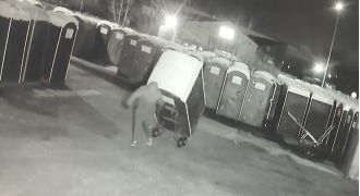 Video footage captures robbers taking 13 portable toilets from a depot.