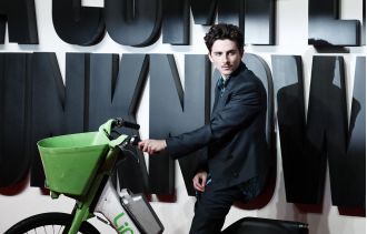 People are making fun of Timothee Chalamet for looking like he's trying too hard as he arrives at the London premiere on an electric bike.