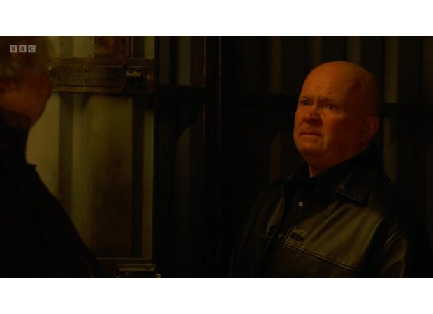 EastEnders' Phil struggles with emotions when discussing mental health conflict.