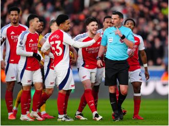 Mike Dean supports Michael Oliver's decision to give Myles Lewis-Skelly a red card during the Wolves vs Arsenal game.