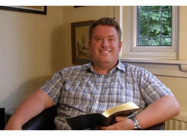 A vicar was reprimanded for not leaving when he accidentally saw a parishioner in the shower.