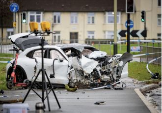 A man passed away following an accident involving an electric Porsche outside a GCHQ facility, resulting in two arrests.