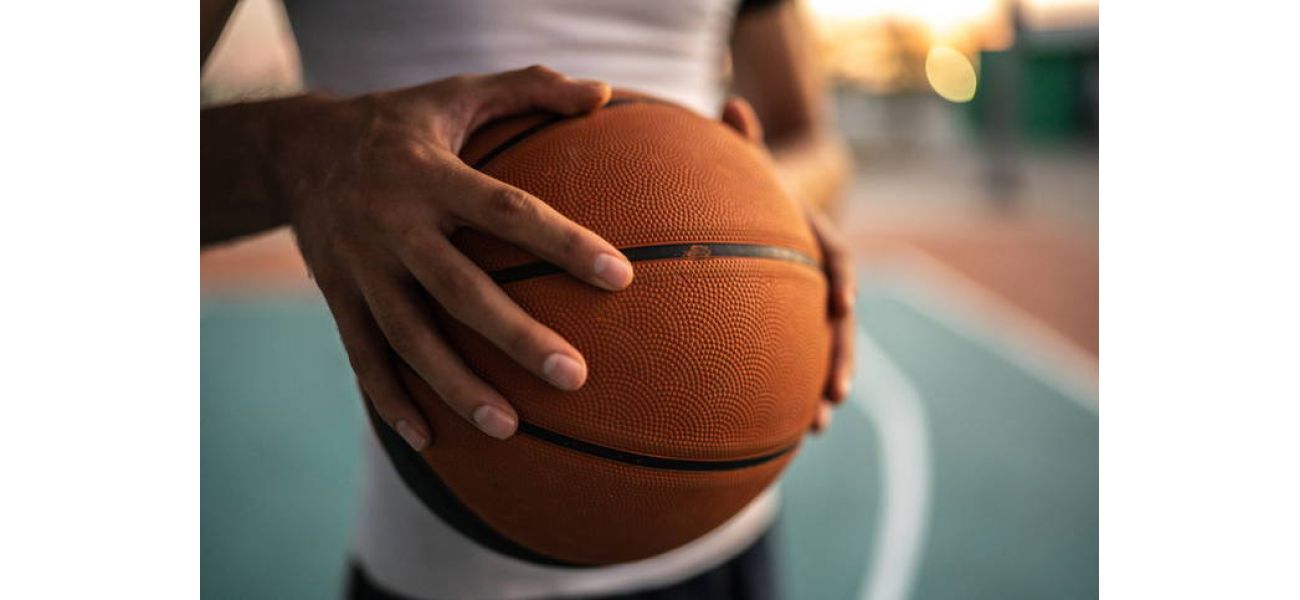 A high school student is accused of attacking another player for using a racial slur during a game.