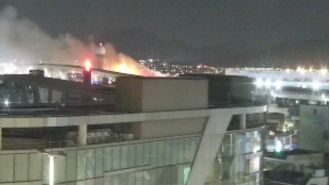 Plane carrying 170 passengers catches fire.