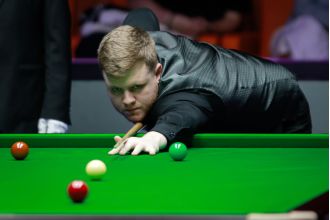 Hill achieves dream with surprise victory against Williams in German Masters.
