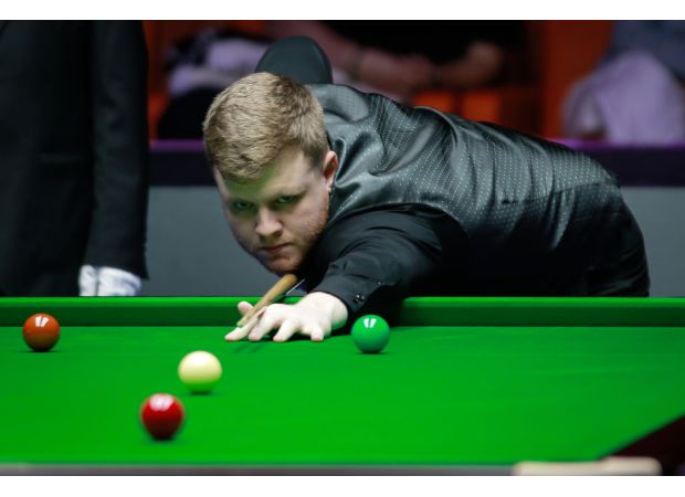 Hill achieves dream with surprise victory against Williams in German Masters.