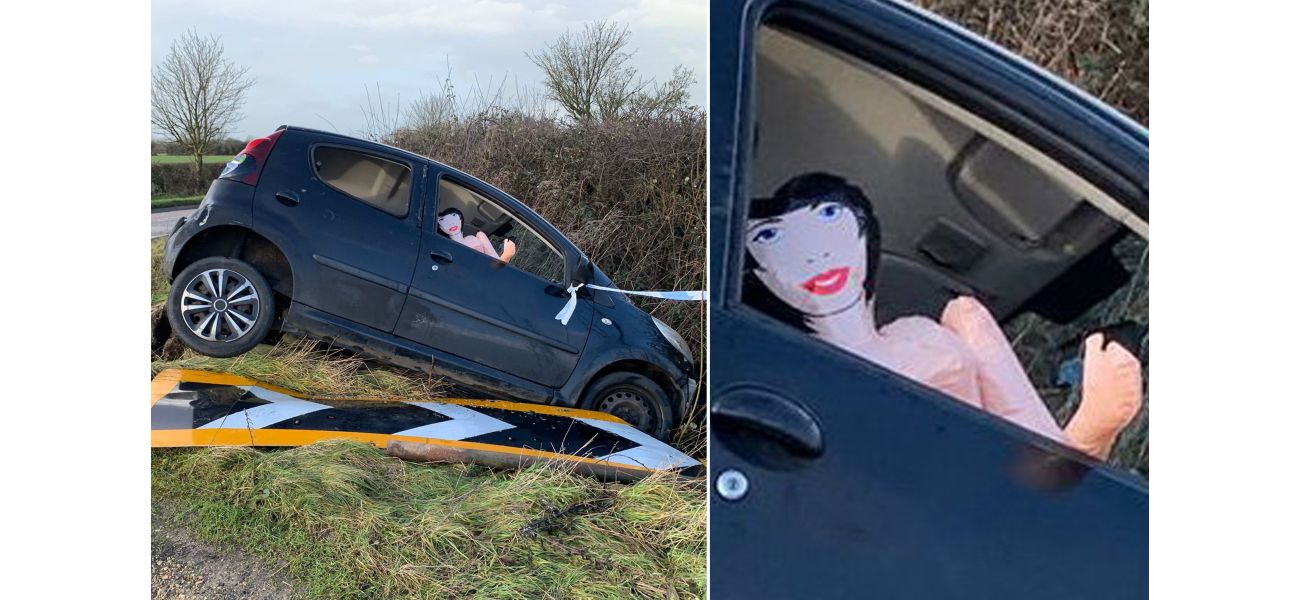 A car was left at the site of an accident with a strange driver still in the front seat.