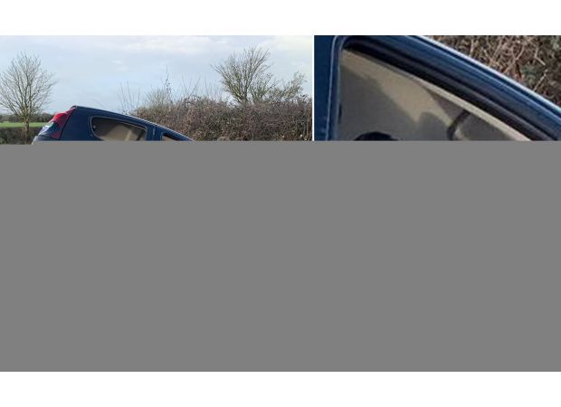 A car was left at the site of an accident with a strange driver still in the front seat.