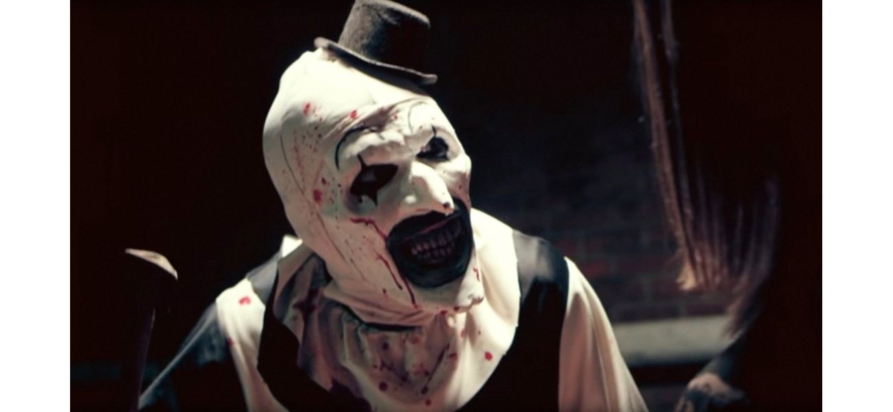 Filmmaker criticized for not incorporating political themes into violent horror series.