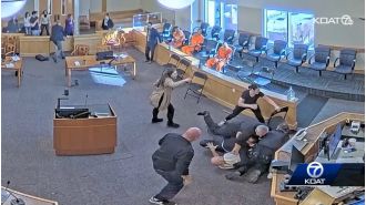 Woman's relative attacks killer and wins during colossal courtroom fight.