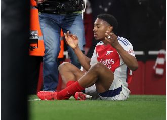 Joe Cole warns Myles Lewis-Skelly not to over-celebrate after Arsenal beats Man City.