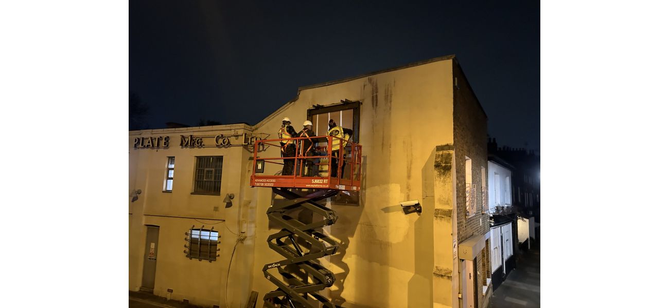 Banksy's iconic artwork in London building removed, causing outrage and disappointment.