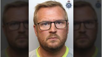 A teacher who secretly took pictures of students' private areas has been imprisoned.
