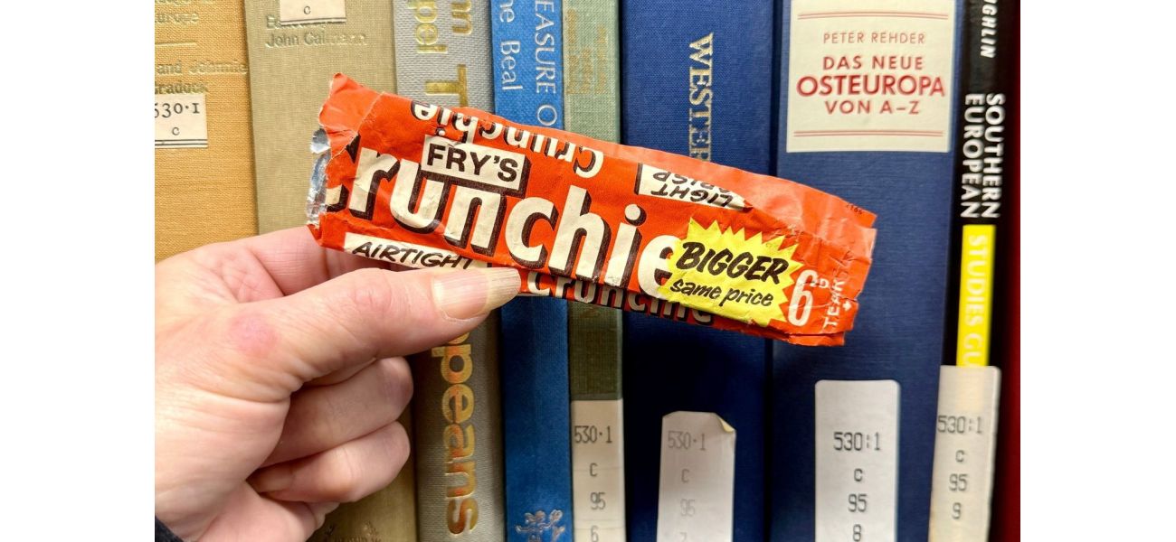 Workers discover old chocolate wrapper in strange location after 50 years.