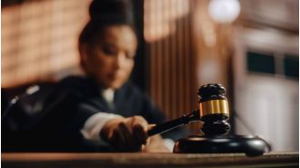 A former police officer has been found guilty of murdering a black man at a gas station in New Mexico.